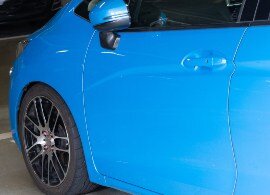 body panel adhesives on blue car