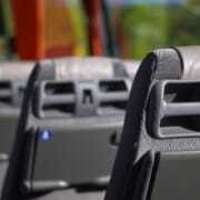 bus seats with grey upholstery bonded with mma adhesive